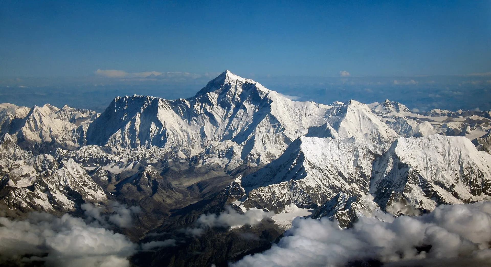 Mount Everest rising above the clouds
