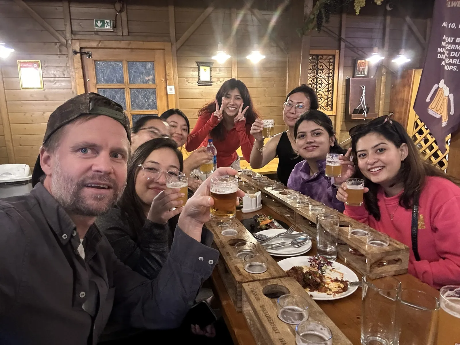Colleagues at a long table during an after-work