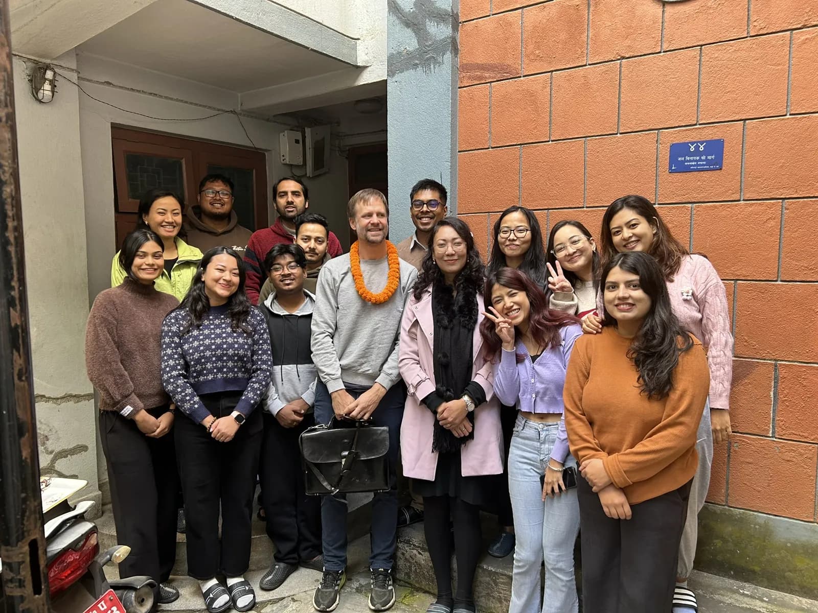 The Himalaya Talents team gathered outside the office entrance in Kathmandu